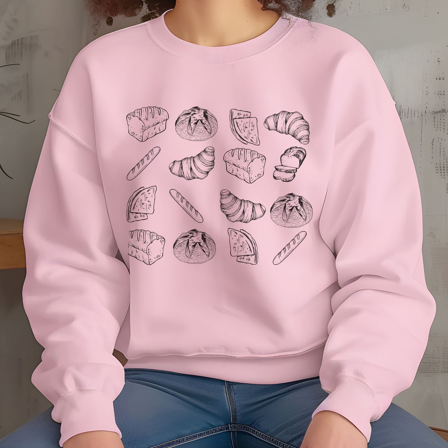 light pink gildan 18000 sweatshirt, variety of bread image