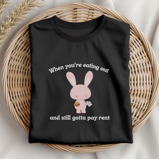 gildan 5000 black t-shirt, when you're eating out text, cute pink bunny image with hamburger and bills